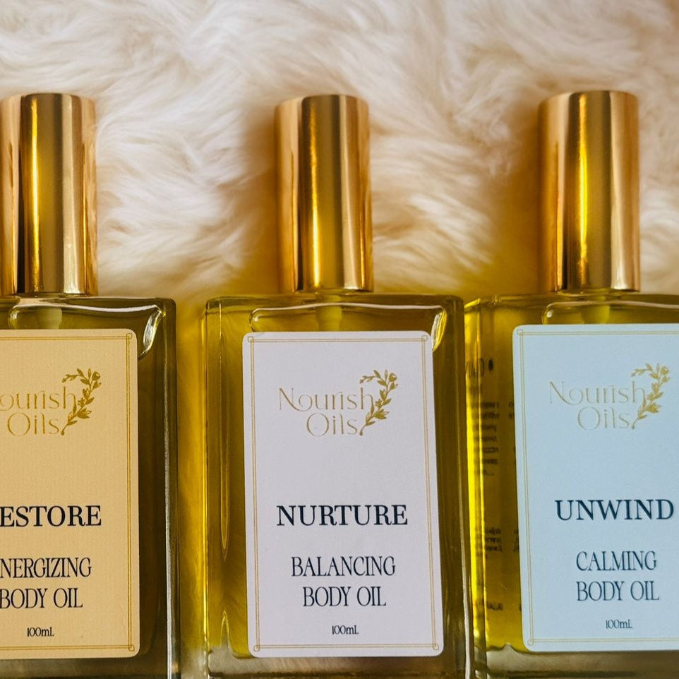 Restore Oil featured alongside Nurture and Flow Oils from Nourish Oils, part of a natural ritual wellness collection.