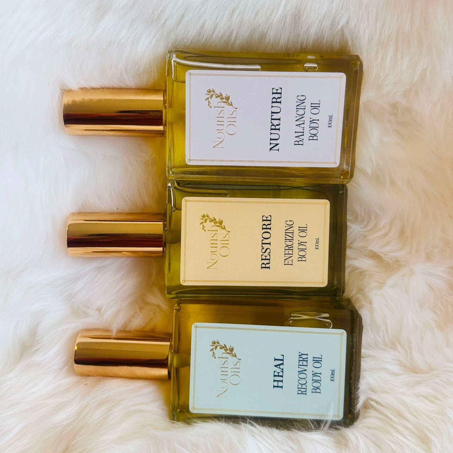 Restore Oil featured alongside Nurture and Flow Oils from Nourish Oils, part of a natural ritual wellness collection.