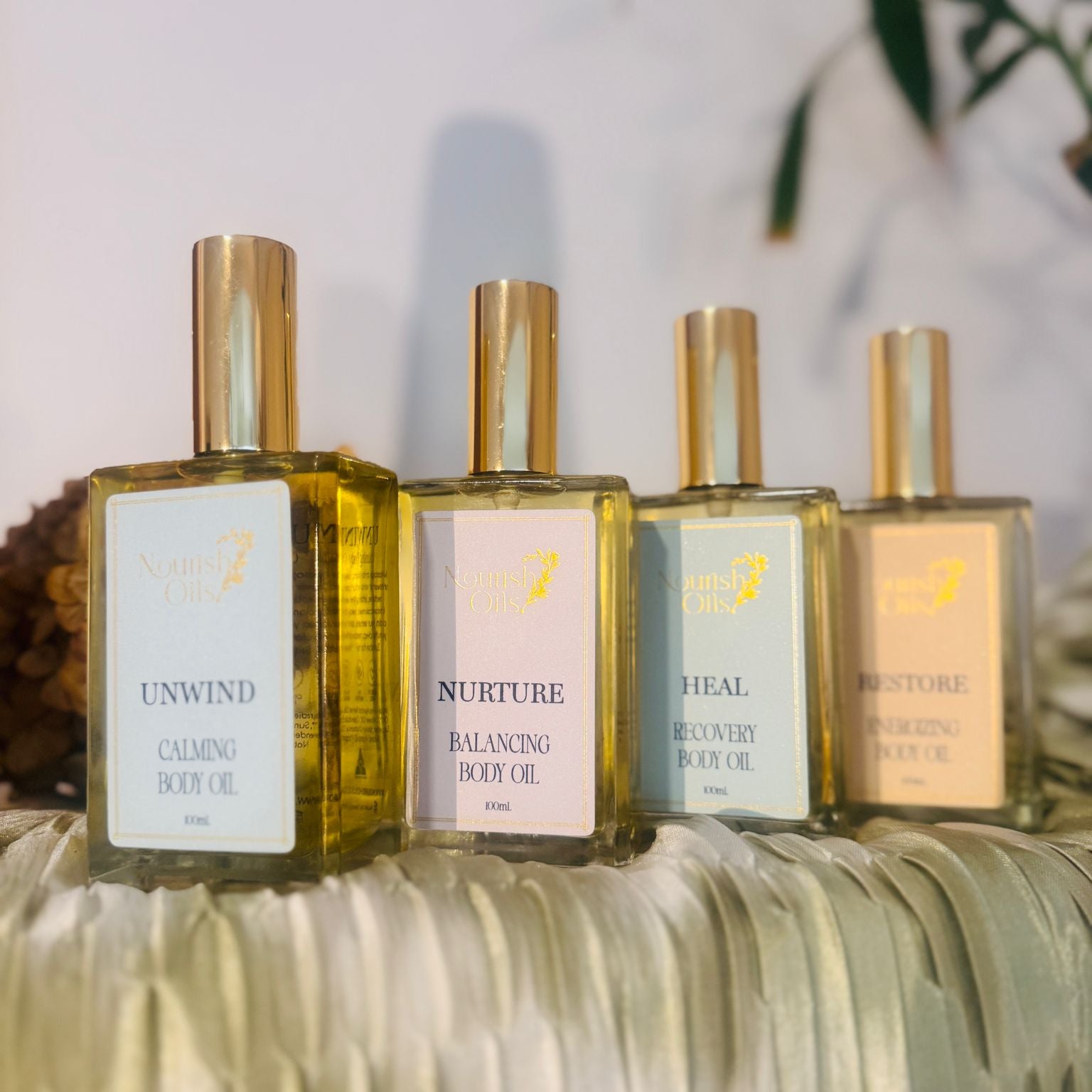 Lavender, chamomile, and jojoba ingredients featured in Nurture Body Oil â€“ calming and healing essential oils.

