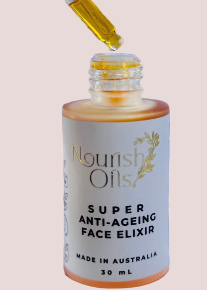 Bottle of Nourish Oils Super Anti-Ageing Face Elixir with a dropper being used.