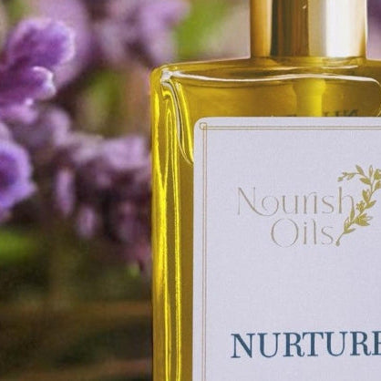Nurture Balancing Body Oil bottle with lavender flowers in the background