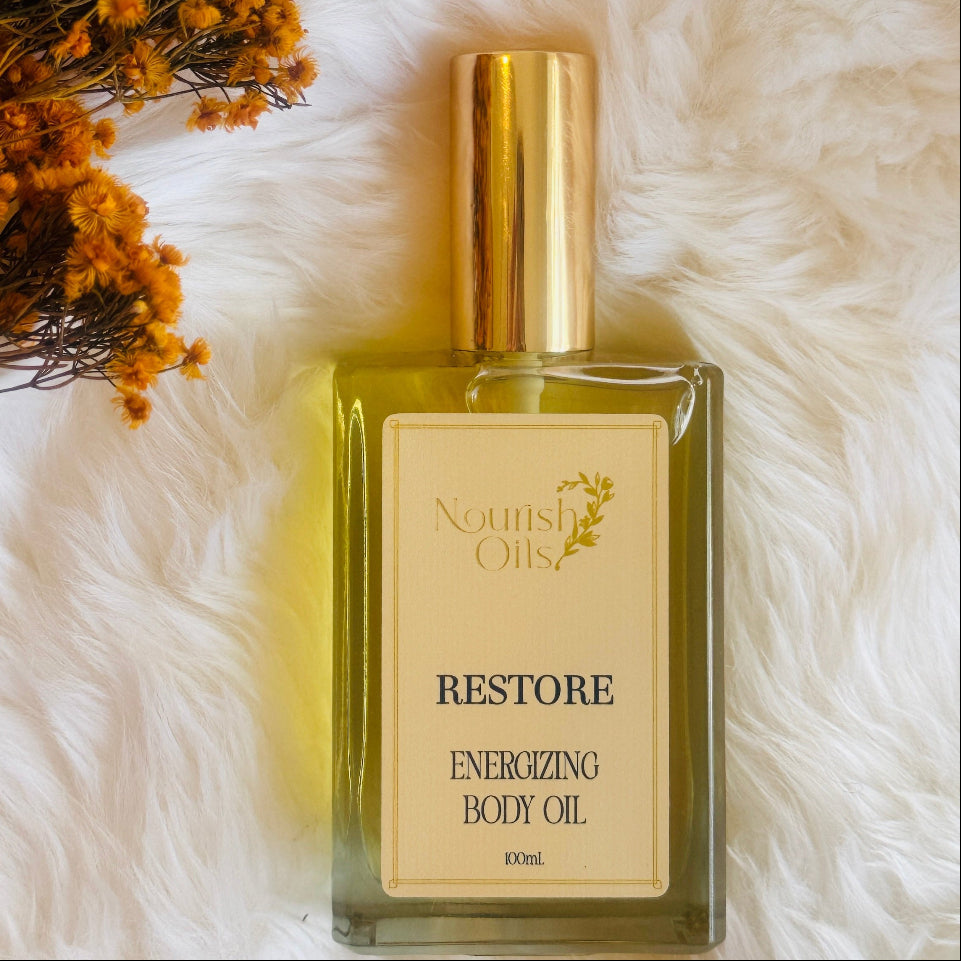 Body and Massage Oil lightweight on sustainable glass bottle with gold lid. Australian Made 